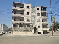 للبيع شقة عضم بلكون رابع 140متر/الرقة_ مقابل غرفة التجارة