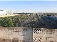 ارض ٦ دلوم جانب مدرسة الامل الخاصة 
