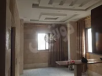للبيع شقة ب الاذقيةا ستراد الثورة مفرق المزارجسر المشاة 