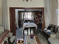شقة حي المحطة طابق اول طابو أخضر إكساء قديم مساحة 176م 5 غرف