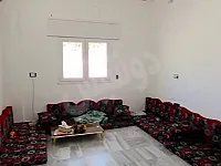 للبيع شقة 105م طابق ثاني غرفتين و منافع/سرمدا شارع المدارس الغربية 