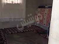 للبيع بيت عربي 100م غرفتين و منافع/ الوحله عند مسبح الدانه الدولي