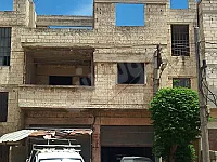 للبيع بناء طابقين حمص شارع الاربعين ضاحية المهاجرين 