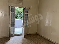 للايجار منزل فاضي طابق اول خلفي 3وصالون اكساء جيد شارع النيل 