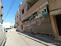 للبيع بناء جنوب مقسم الهاتف وادي الذهب ب 7 شوارع