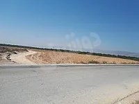 أرض في القصير، 12 دونم، قريبة من حمص ولبنان، استثمار السياحي والتجاري.