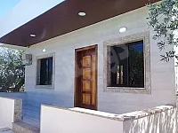 للبيع ارض دنم ضمنه ستديو اللاذقية طريق كسب الدروقيات