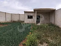 للبيع مزرعة عضم 500م وبناء 100مو اشتراك جب بحري/حماه مزارع الضاهرية