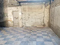 محل تجاري(كراج خلفي)مساحة 21m مع قبو بنصف المساحة مقابل جامع زينو