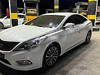 هيونداي غراندور 2013 للإيجار موجودة في دوما - سيارة أوتوماتيك بيضاء