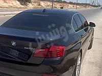 سيارة بي ام دبليو 520i لون اسود نضافة جيدة جدا ماشية 137000 فرش جلد 