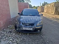 كيا ريو خالية برا جوا عدا قطعتين كير عادي 2006 السعر 5300