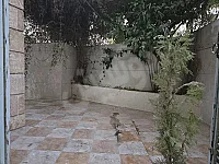 شقة 6 غرف وموزع وجنينة امامية مرتفعه حلب شارع النيل