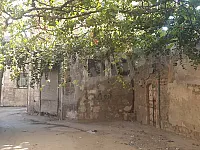 مبنى سكني طابقين ملاصق لجامع الاحدب مع دكان 