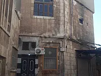 مبنى سكني طابقين ملاصق لجامع الاحدب مع دكان 