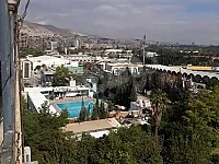 شقتين فوق بعض بالمزرعة طلعة الميسات جانب مطعم بوز الجدي 