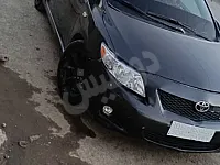 تويوتا كورولا 2009 مستعملة للبيع في الرقة اللون جردوني