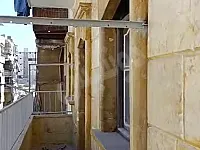 شقة للبيع ط٣ كرم الخياطة بناية التوحيد