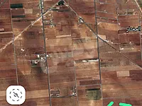 أرض زراعية للبيع في مركز القصير - 12 م² - طابو نظامي