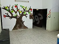 شقة بمساحة ٢٠٠ متر و هي عبارة عن معهد تدريسي امامه بوفيه تابع للمعهد