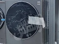 ماكينة غسيل وتنشيف إل جي 9 كغ جديدة بتقنية إنفيرتر