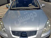 كيا ريو 2010 خالية برا جوا نظافة تامة تواجد حلب