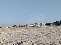 للبيع ارض جنب القرية الشامية تلت دونمات وشوي 