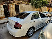 سيارة كيا سيراتو 2009 للايجار في حلب - أوتوماتيك وأبيض