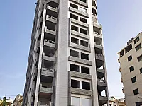 شقة سكنية للبيع/عالعضم/ضمن برج كامل الخدمات/طرطوس-حي الغدير